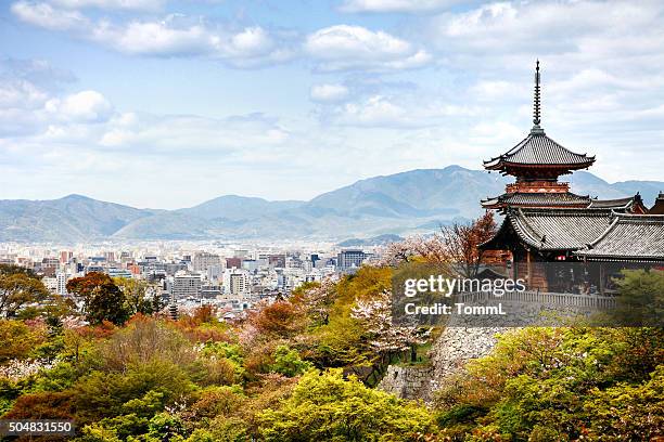 kiyomizu-dera temple buildings with kyoto, japan city skyline and mountains - kiyomizu temple stock pictures, royalty-free photos & images