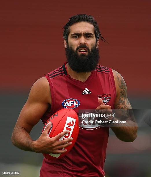 Courtenay Dempsey of the Bombers runs with the ball during an Essendon Bombers AFL training session at True Value Solar Centre on January 14, 2016 in...