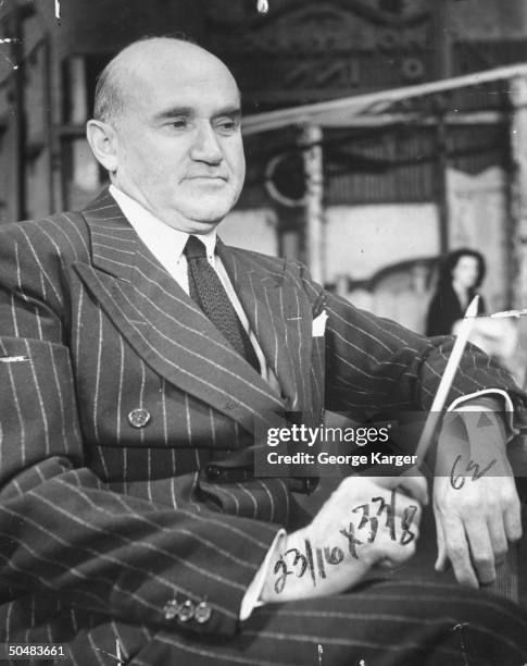 Movie studio owner Samuel Goldwyn posing for a picture.