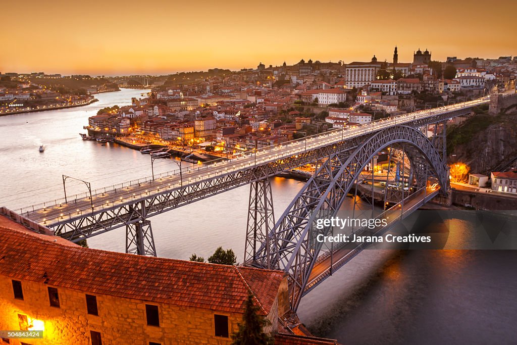 General view of Douro river and city of Oporto al sunset. Porto (Oporto), Portugal