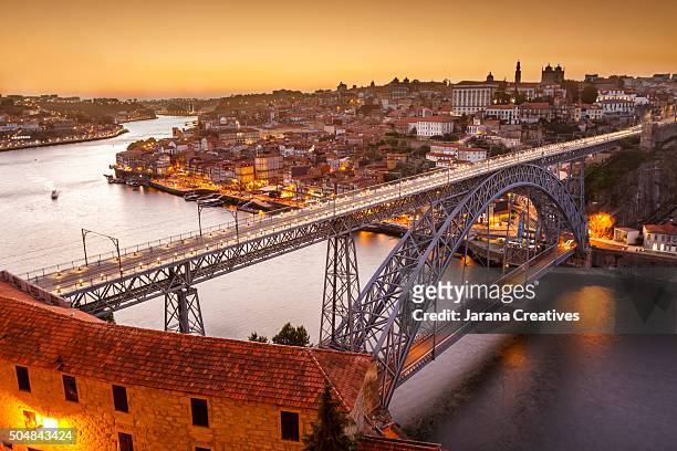 general view of douro river and city of oporto al sunset. porto (oporto), portugal - porto stock pictures, royalty-free photos & images
