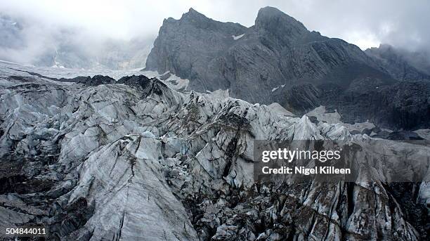 glacier ice fall jade dragon snow mountain - ice dragon stock pictures, royalty-free photos & images