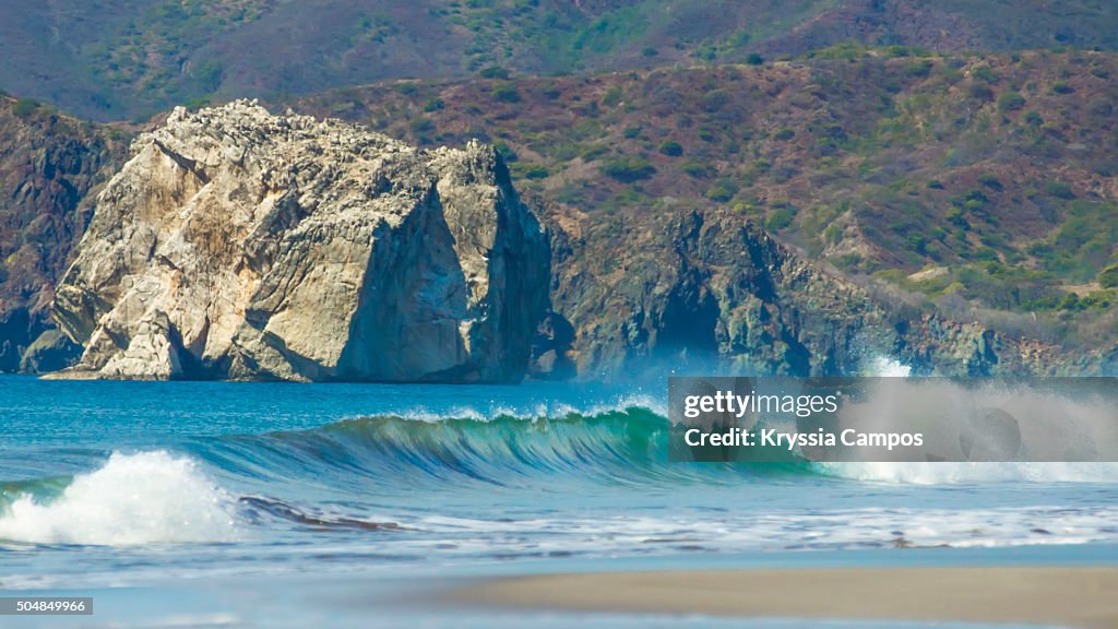 The paradise surf beach of Playa Naranjo and WitchÂ’s Rock in the Santa Rosa National Park in Guanacaste, Costa Rica