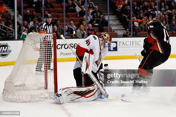 Craig Anderson of the Ottawa Senators blocks a shot on goal by Ryan Getzlaf of the Anaheim Ducks during the first period of a game at Honda Center on...