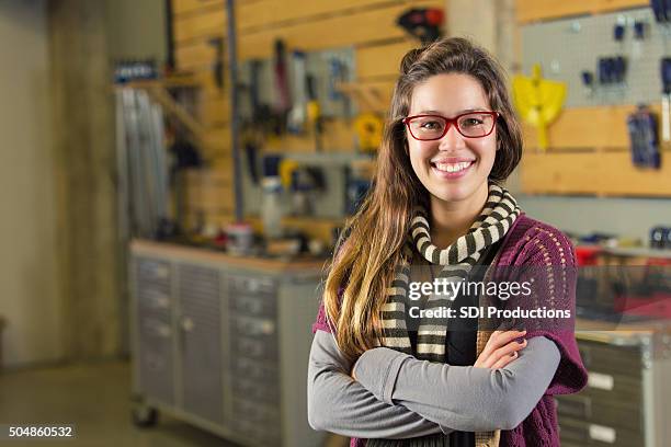 hipster college student or entrepreneur in makerspace workshop - music shop stock pictures, royalty-free photos & images