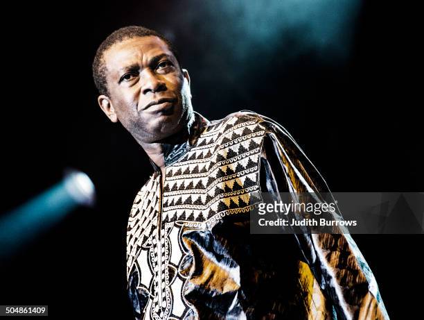 Senegalese singer-songwriter and musician Youssou N'Dour performing with his band at the WOMAD Festival at Charlton Park, Wiltshire, July 2014.