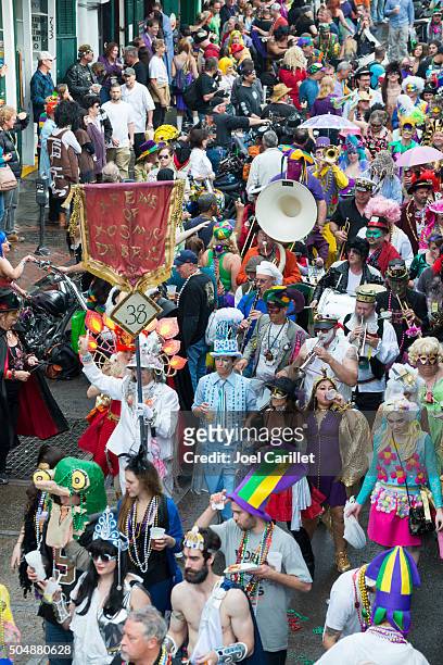 costumes and music celebrating mardi gras - new orleans - new orleans music stock pictures, royalty-free photos & images