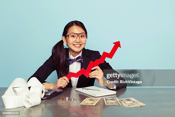 japanese woman accountant is growing business - super excited suit stock pictures, royalty-free photos & images