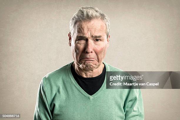 portraits of an elderly man - expressions -  sad crying - crying man stock pictures, royalty-free photos & images
