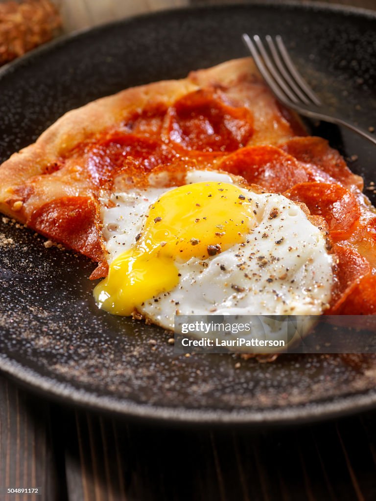 Hangover Breakfast,Leftover Pizza with a Fried Egg