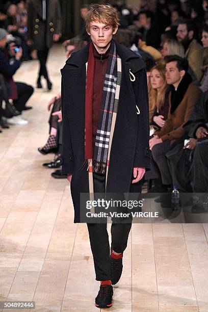 Model walks the runway at the Burberry show during The London Collections Men AW16 at Kensington Gardens on January 11, 2016 in London, England.