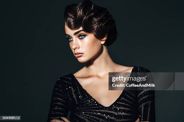 studio shot of young beautiful woman - hair fashion stockfoto's en -beelden