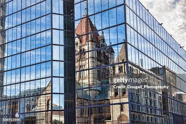 boston trinity church, copley square, reflected in john hancock tower - hancock building stock pictures, royalty-free photos & images