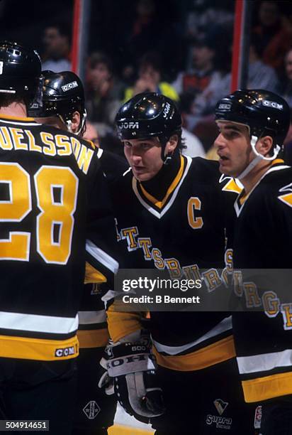 Mario Lemieux and Kevin Stevens of the Pittsburgh Penguins celebrate a goal during the game against the Philadelphia Flyers on March 2, 1993 at the...