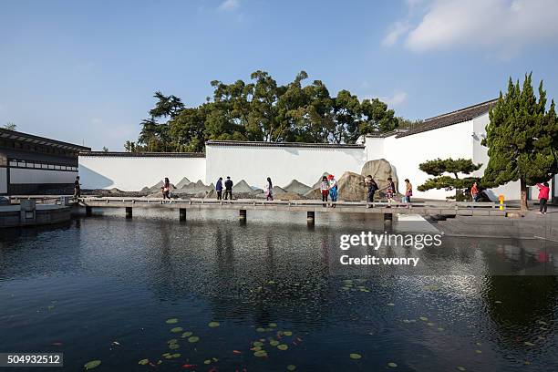 tourists in suzhou museum - suzhou stock pictures, royalty-free photos & images
