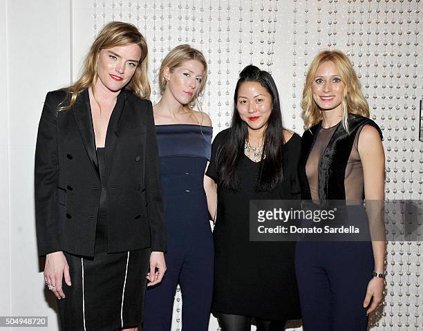 Galvan's Sola Harrison and Anna-Christin Haas, designer Carol Lim, and Galvan's Katherine Holmgren attend the Galvan For Opening Ceremony Dinner...