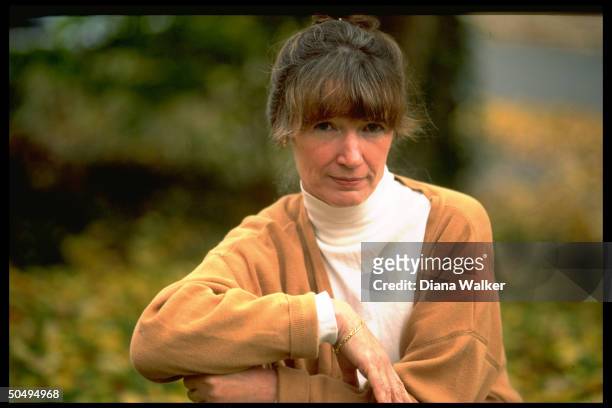 Portrait of author Anne Tyler posing outside home