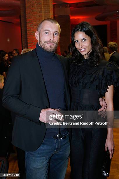 Model Ana Carolina Reis and her husband Yvan Reis attend the 'Jean Nouvel and Claude Parent, Musees a venir' Exhibition Opening at Galerie Azzedine...