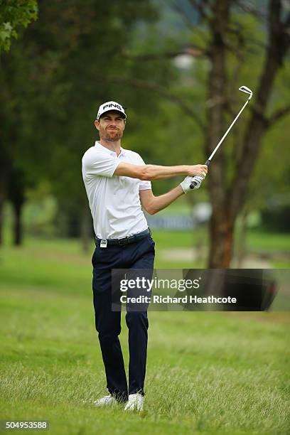 Rhys Davies of Wales plays his second shot on the 15th hole on the West coruse during day one of the Joburg Open at Royal Johannesburg and Kensington...