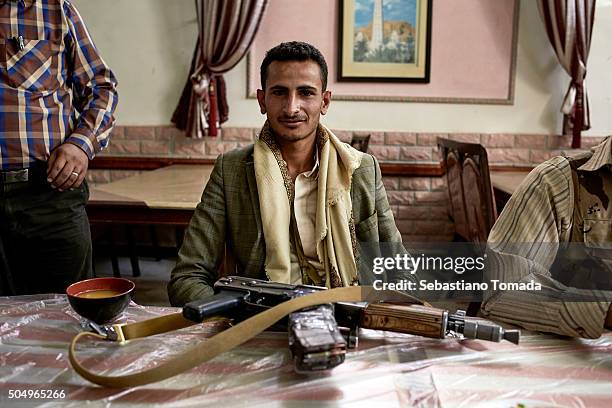 Houthi fighter at breakfast near Sadah, Yemen, on June 14, 2015.