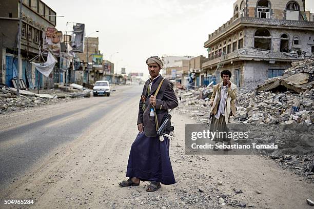 Houthi fighters patrol the main street of Sadah. The Arab coalition has been carrying out air strikes on a daily basis in Yemen's Sadah, a bastion of...