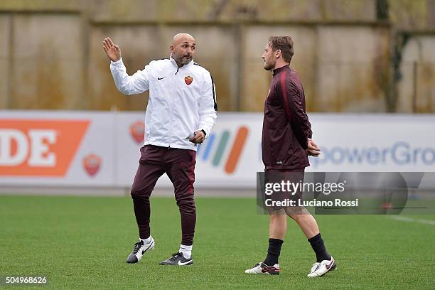 New coach of AS Roma Luciano Spalletti and Francesco Totti during a training session on January 14, 2016 in Rome, Italy.