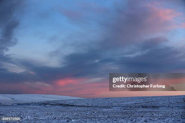 Temperatures drop as night time falls and snow blankets moors in the Peak District near Buxton on January 14, 2016 in Buxton, England. Overnight...