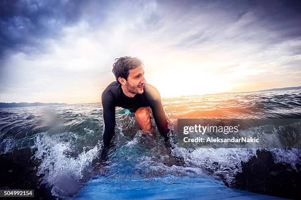 surfer's joy - surfer wave stock pictures, royalty-free photos & images