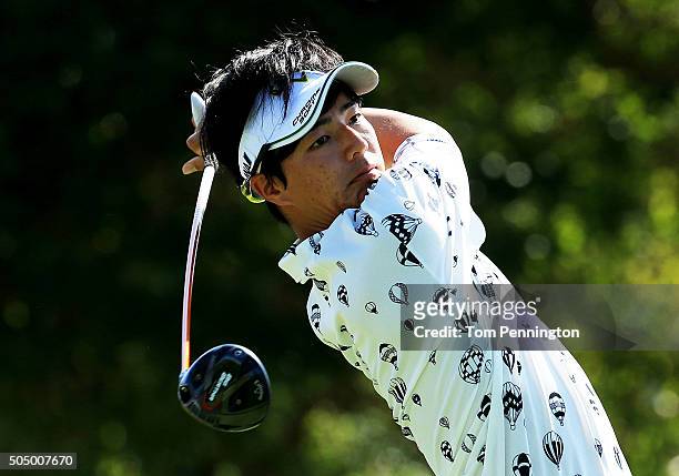Ryo Ishikawa of Japan plays his shot from the first tee during the first round of the Sony Open In Hawaii at Waialae Country Club on January 14, 2016...