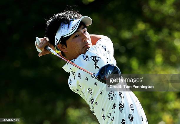 Ryo Ishikawa of Japan plays his shot from the first tee during the first round of the Sony Open In Hawaii at Waialae Country Club on January 14, 2016...