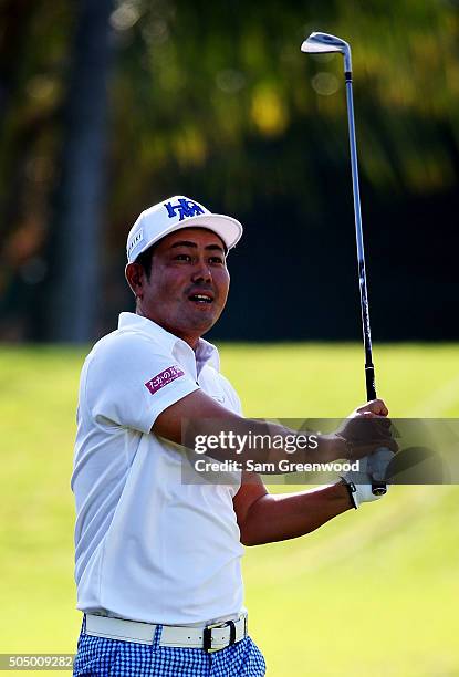 Hideto Tanihara of Japan plays a shot on the 14th hole during the first round of the Sony Open In Hawaii at Waialae Country Club on January 14, 2016...