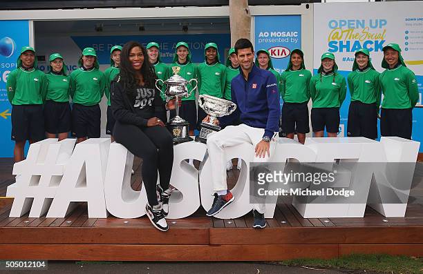Serena Williams of the USA and Novak Djokovic of Serbia pose with the trophies during the 2016 Australian Open official draw at Melbourne Park on...