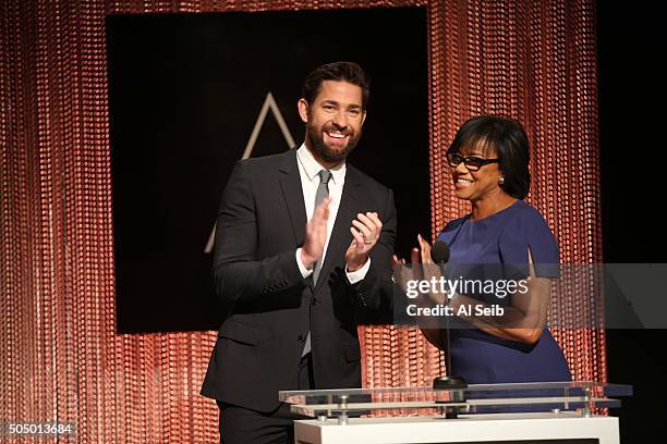 Actor John Krasinski and Academy President Cheryl Boone Isaacs applaude the nominees as they conclude the announcement of the 88th Academy Awards...