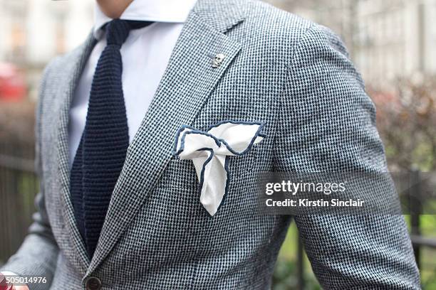 Tailor and fashion blogger Vlad Kotski wears a Suit Supply suit, tie and pocket square, and Hugo Boss shirt on day 4 of London Collections: Men on...