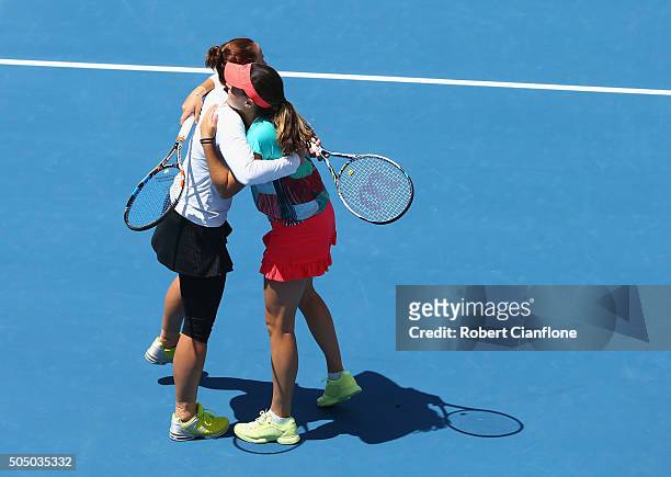 Jarmila Wolfe and Kimberly Birrell of Australia celebrate after they defeated Anabel Medina Garrigues and Arantxa Parra Santonja of Spain to win the...
