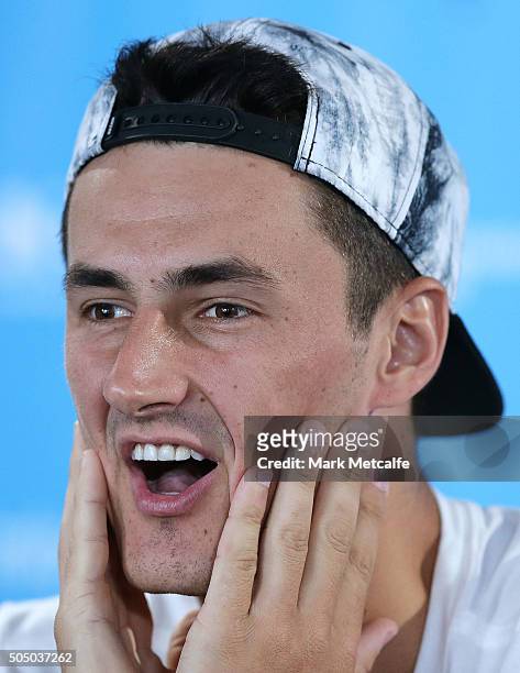 Bernard Tomic of Australia speaks in a press conference after forfeiting his quarter final match against Teymuraz Gabashvili of Russia during day six...