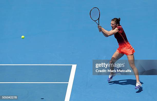 Simona Halep of Romania plays a backhand in her semi final match against Svetlana Kuznetsova of Russia during day six of the 2016 Sydney...