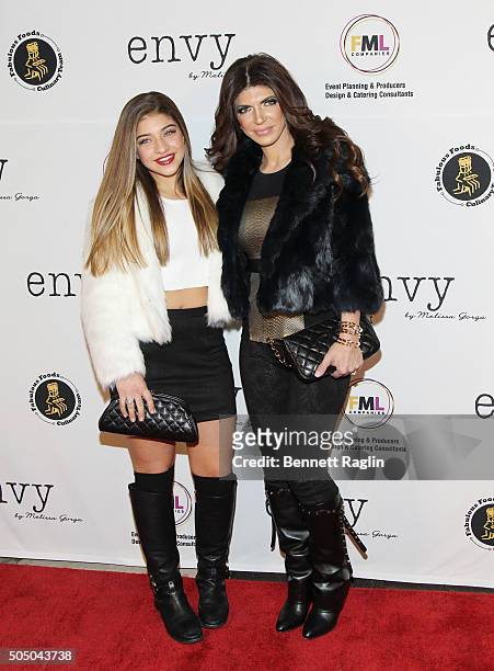 Personalities Gia Giudice and Teresa Giudice attends the grand opening of envy by Melissa Gorga Boutique on January 14, 2016 in Montclair, New Jersey.