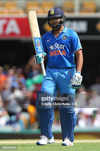 Rohit Sharma of India celebrates his half century during game two of the Victoria Bitter One Day International Series between Australia and India at...