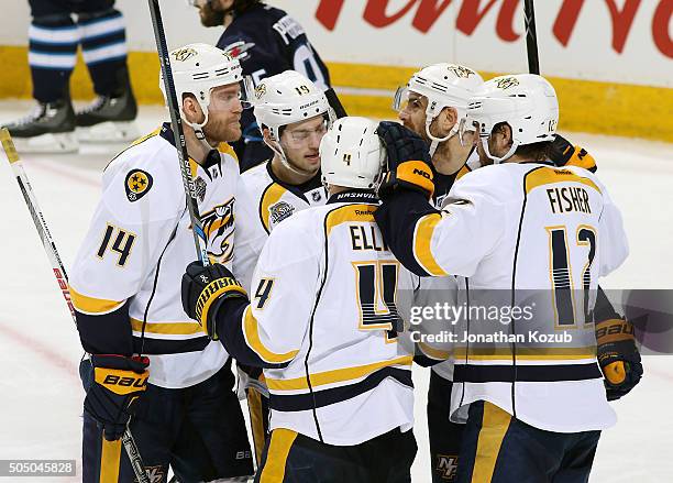 Mattias Ekholm, Calle Jarnkrok, Ryan Ellis, Eric Nystrom and Mike Fisher of the Nashville Predators celebrate a third period goal against the...