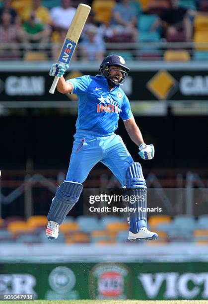 Rohit Sharma of India celebrates scoring a century during game two of the Victoria Bitter One Day International Series between Australia and India at...