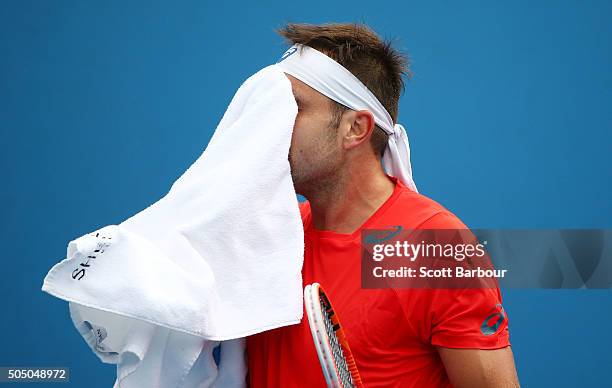 Marinko Matosevic of Australia reacts in his match against Alejandro Gonzalez of Colombia during round two of 2016 Australian Open Qualifying at...