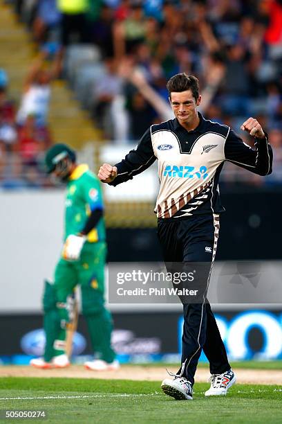 Mitchell Santner of New Zealand celebrates his wicket of Shoaib Malik of Pakistan during the first T20 match at Eden Park on January 15, 2016 in...