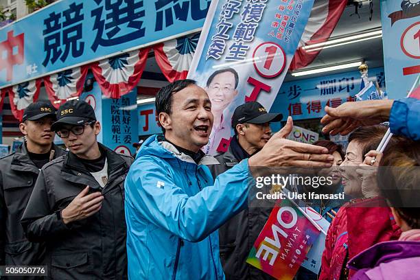 Kuomintang Party presidential candidate Eric Chu, shakehands with the supporters during rally campaign ahead of the Taiwanese presidential election...