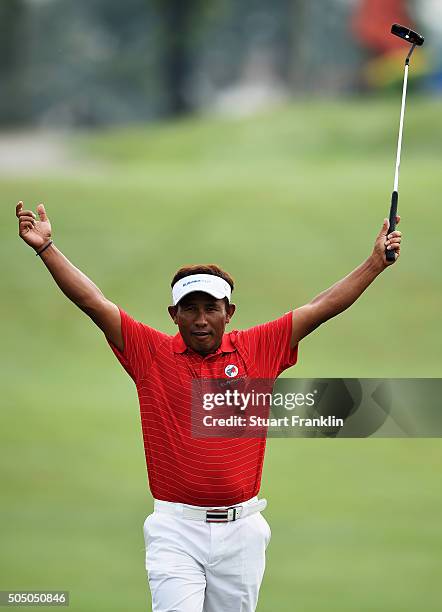 Thongchai Jaidee of team Asia celebrates a putt during the first day's fourball matches at the EurAsia Cup presented by DRB-HICOM at Glenmarie G&CC...