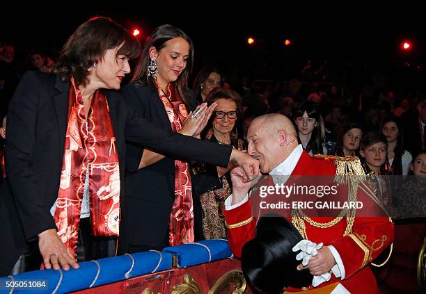 Ringmaster Alain Andre, a.k.a. "Petit Gougou" greets Princess Stephanie of Monaco and her daughter Pauline Ducruet during the opening of the 40th...