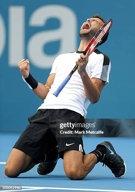 Grigor Dimitrov of Bulgaria celebrates winning match point in his semi final match against Gilles Muller of Luxembourg during day six of the 2016...