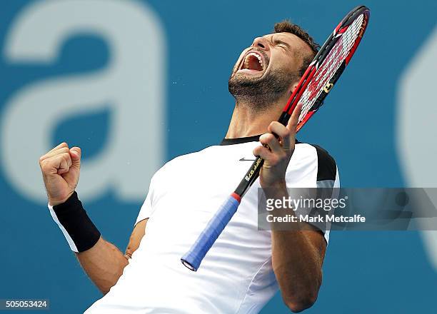 Grigor Dimitrov of Bulgaria celebrates winning match point in his semi final match against Gilles Muller of Luxembourg during day six of the 2016...