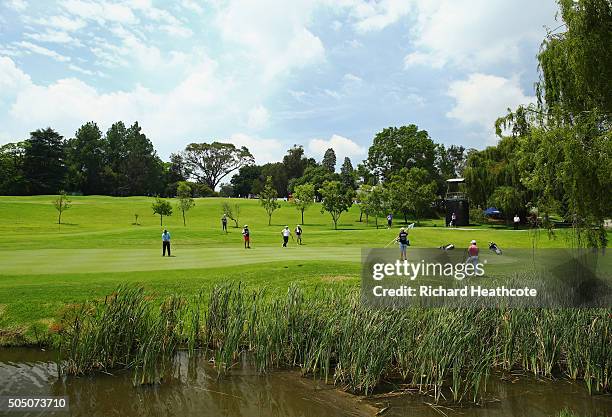 General view as Ross McGowan of England putts on the 16th green on the West Course during day two of the Joburg Open at Royal Johannesburg and...
