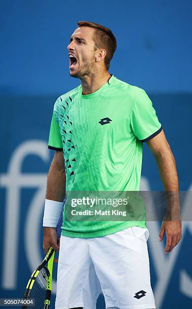 Viktor Troicki of Serbia celebrates bringing up match point in his semi final match against Teymuraz Gabashvili of Russia during day six of the 2016...
